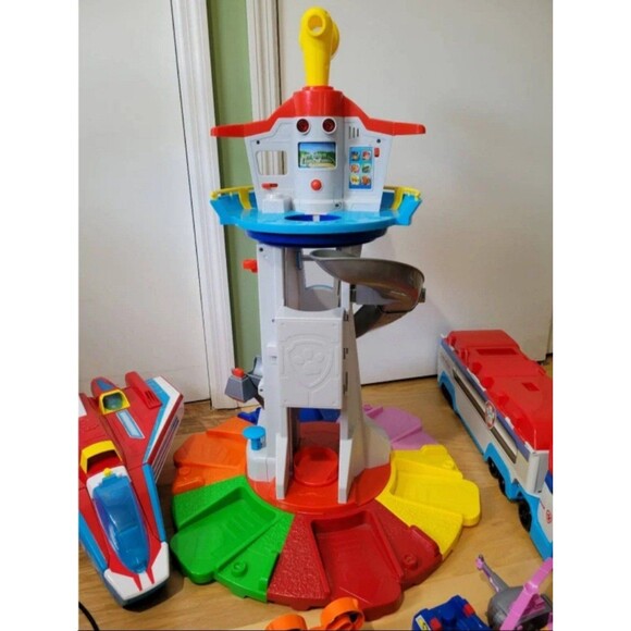 A huge lot of paw patrol toys includes lookout tower, bus, plane, and ship - Picture 6 of 7